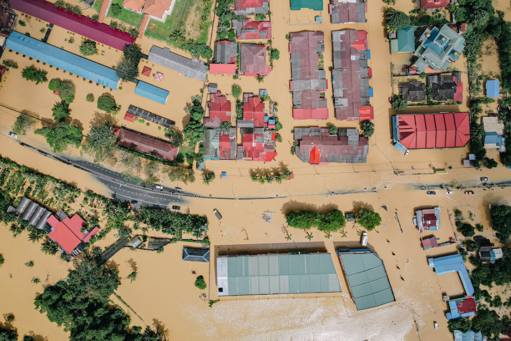 A photo showing flooded streets and properties from above