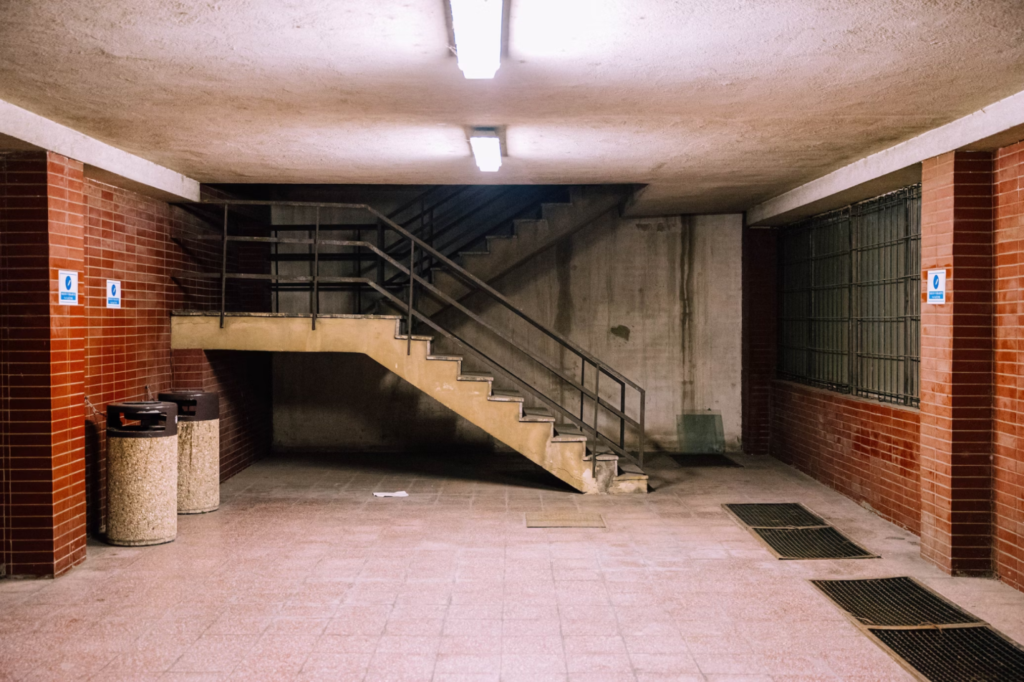 A photo showing the interior of a building with brick walls