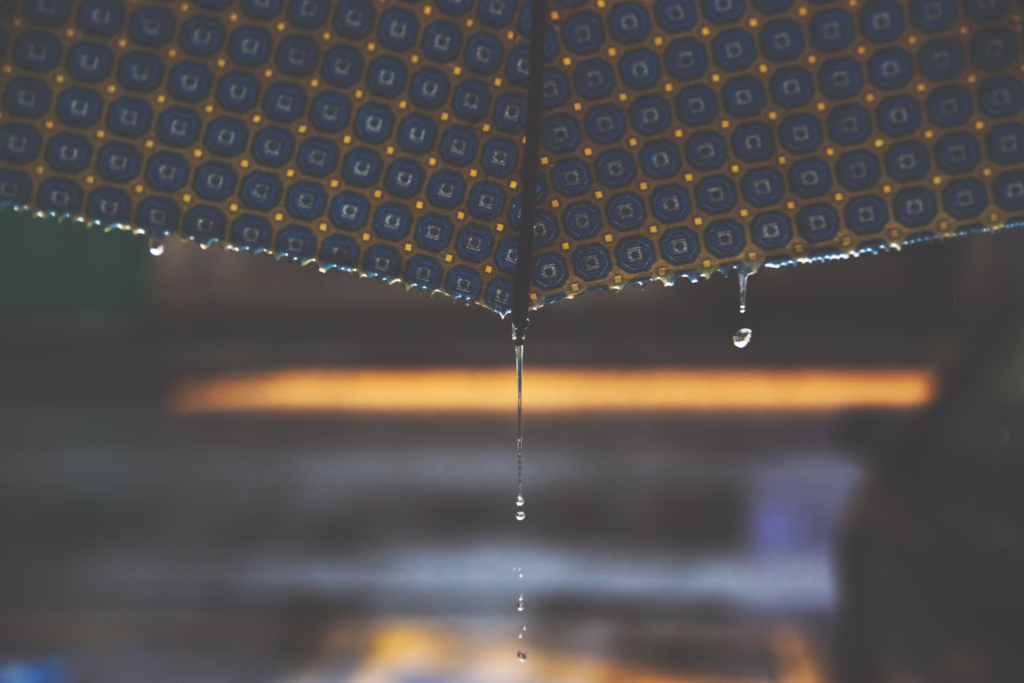 A photo showing a close-up of an umbrella.