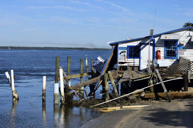 A beach house damaged by hurricane and rain